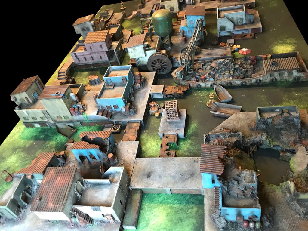 Sumptown Necromunda Terrain The air of Sumptown is thick with the acrid scent of polluted mist and the constant murmur of distant machinery.